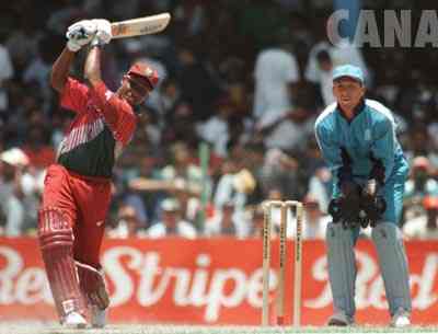 Brian Lara lofts one over cover during the 5th ODI vs. England at home in 1998